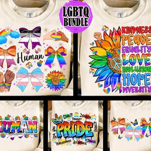 May include: A selection of cream-coloured sweatshirts with vibrant LGBTQ+ designs. The designs include bows, rainbows, sunflowers, and the words "Human" and "Pride". The sweatshirts are part of an LGBTQ bundle.