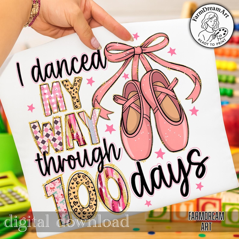 May include: White t-shirt with the text "I danced MY WAY through 100 days." The design includes pink ballet shoes, a pink bow, and pink stars. The words "MY WAY" are in a patterned design. The words "digital download" are at the bottom.