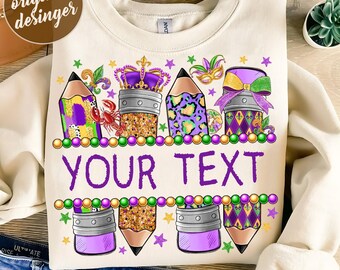 May include: A sublimation design featuring a row of five purple, gold, and green pencils with Mardi Gras beads and stars. The text "YOUR TEXT" is written in purple on a white background.