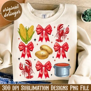 K&ouml;nnte beinhalten: Ein Sublimationsdesign mit wei&szlig;em Hintergrund, roten Schleifen, Maiskolben, Hummern, Kartoffeln und einem roten Topf mit grauem Deckel. Das Design ist perfekt f&uuml;r die Erstellung von individueller Kleidung, Tassen, Tragetaschen und anderen Artikeln.