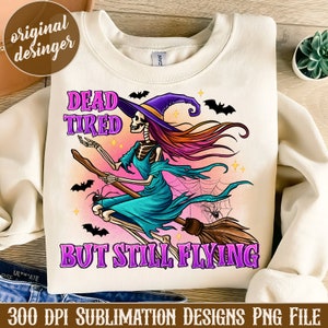 May include: Cream-colored sweatshirt featuring a skeleton witch riding a broom, with the text "DEAD TIRED BUT STILL FLYING." The witch wears a teal dress and a purple hat. Bats and a spiderweb are also visible. The design is a sublimation PNG file.