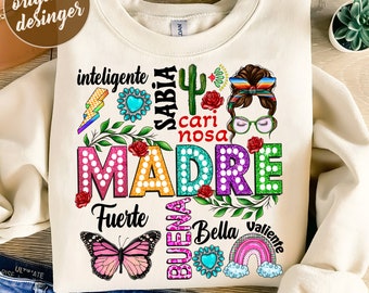 May include: Cream-colored sweatshirt with a colorful graphic design. The design includes the word "MADRE" in large, multi-colored letters, surrounded by other words and illustrations like a butterfly, cactus, and rainbow. The text "300 DPI SUBLIMATION DESIGNS PNG FILE" is at the bottom.