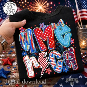 May include: Black t-shirt with a colorful "AMERICA" graphic design. The letters are decorated with stars, stripes, and patterns in red, white, and blue. The shirt has a crew neck and is a digital download.