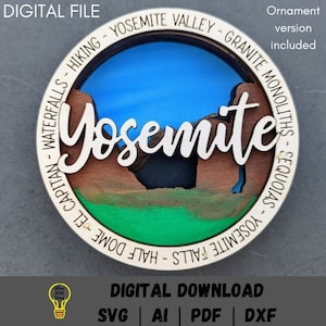 May include: A round wooden ornament with a painted scene of Yosemite National Park. The ornament features the word "Yosemite" in a stylized font and includes details like Half Dome, El Capitan, waterfalls, and granite monoliths. The ornament is a digital download and includes SVG, AI, PDF, and DXF files.