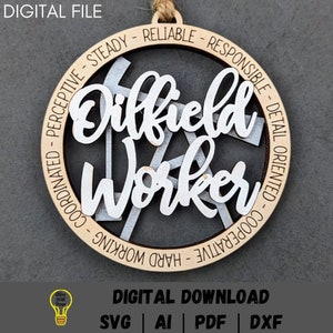 May include: A wooden ornament with the words "Oilfield Worker" in white lettering on a brown background. The ornament is decorated with a circle of text that reads "Coordinated - Perceptive - Steady - Reliable - Responsible - Detail Oriented - Cooperative - Hard Working".
