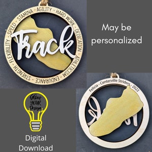 May include: A wooden ornament with a running shoe design and the words "Felicia - Centerville Striders - 2022" around the edge. The ornament is black with a gold shoe design. The ornament is a digital download.