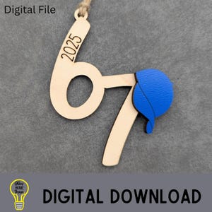 May include: Wooden ornament shaped as the number 67 with a blue paint stroke. The year 2025 is engraved on the top. The words "Digital File" and "Digital Download" are also visible.