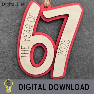 May include: A layered wooden ornament with a red border and a natural wood interior. The ornament features the number "67" with the text "THE YEAR OF" and "2025". A digital file download.