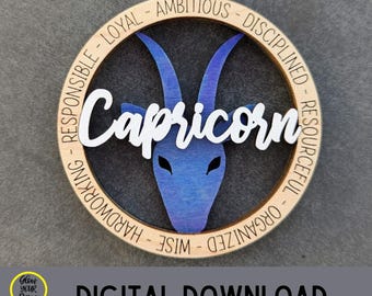 May include: Wooden Capricorn zodiac sign ornament with a blue goat illustration and the word "Capricorn" in white. The ornament is circular with the words "Responsible", "Loyal", "Ambitious", "Disciplined", "Resourceful", "Organized", "Wise", and "Hardworking" around the edge.