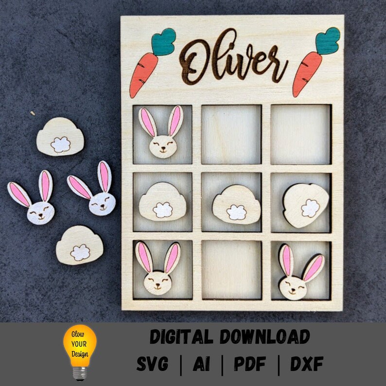 May include: A wooden tic-tac-toe game with a bunny and cloud theme. The game board is personalized with the name "Oliver".