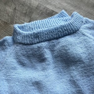 blue knit sweater