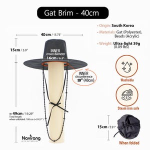 May include: A black Gat hat with a 15.75-inch brim and 6.3-inch inner crown diameter. It features black beaded chin straps, weighs 0.09 lbs, and is made of polyester and acrylic. The hat is washable, steam iron safe, and folds to 5.91 inches.