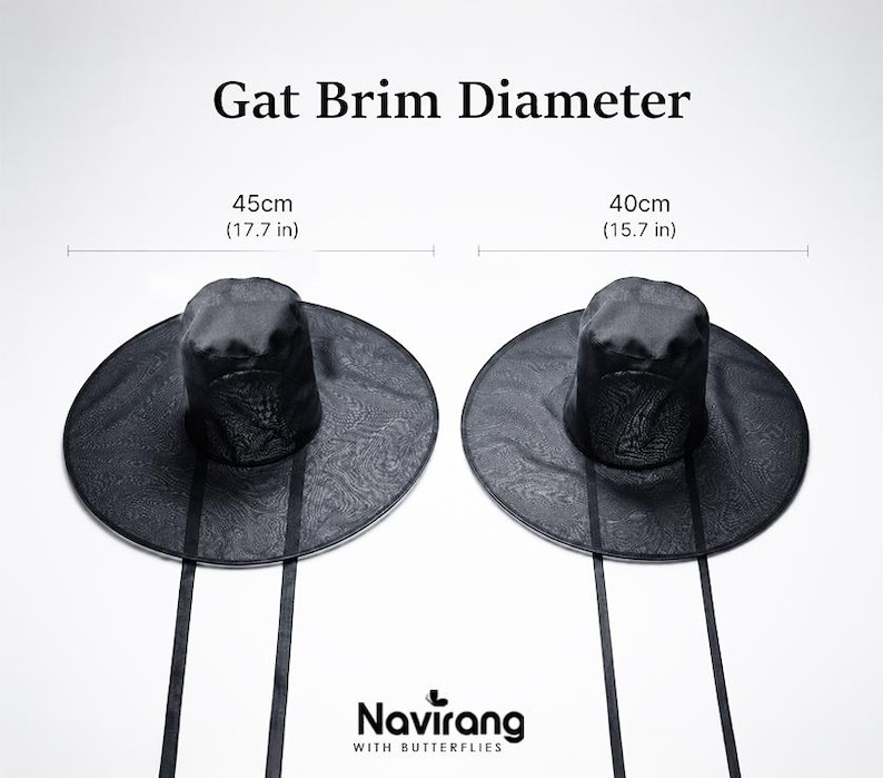May include: Two black Gat hats with long ribbons, featuring a textured mesh crown and wide brim. The image displays two sizes: one with a 17.7 inch brim diameter and one with a 15.7 inch brim diameter. The text reads Gat Brim Diameter and Navirang.