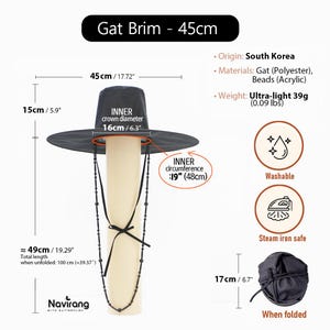 May include: A black Gat hat with a 45 cm brim, 16 cm inner crown diameter, and 19-inch inner circumference. It features a beaded chin strap, weighs 0.09 lbs, and measures 19.29 inches in total length. The hat is washable, steam iron safe, and folds to 6.7 inches.