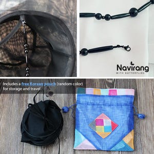 May include: A black hat with a beaded trim featuring cylindrical and spherical beads. The set includes a black drawstring pouch and a blue fabric pouch with a multicolored geometric patch and the text Navirang WITH BUTTERFLIES.