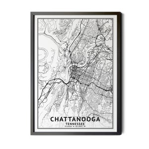 May include: A framed black and white map print of Chattanooga, Tennessee. The map details the city's streets, waterways, and surrounding topography. The city's name and coordinates are printed at the bottom of the map.