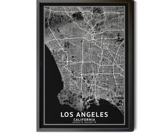 May include: A framed monochrome map of Los Angeles, California. The map depicts the city's road network and surrounding regions. The text "LOS ANGELES CALIFORNIA" is at the bottom, with coordinates. The frame is black.