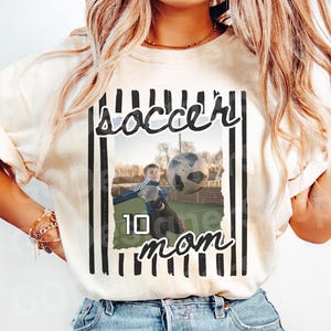 Personalized soccer mom shirt with custom number featuring soccer player photo style design on Comfort Colors ivory t-shirt