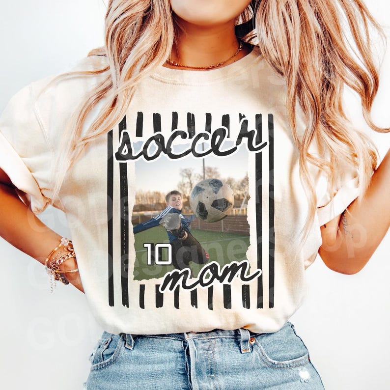 Personalized soccer mom shirt with custom number featuring soccer player photo style design on Comfort Colors ivory t-shirt