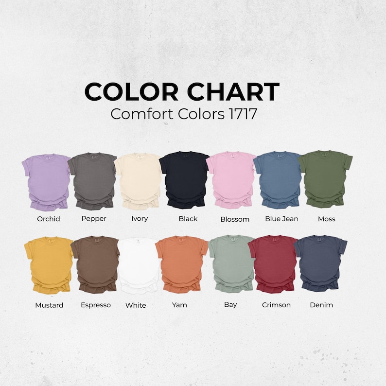 May include: A color chart displays a variety of Comfort Colors 1717 t-shirts in various hues. The shirts are arranged in rows, showcasing colors like Orchid, Pepper, Ivory, Black, Blossom, Blue Jean, Moss, Mustard, Espresso, White, Yam, Bay, Crimson, and Denim.