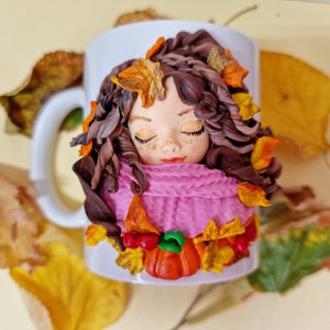 3D glass with autumn decoration made of polymer clay. Girl with autumn leaves. Autumn cup. Mug with autumn motifs. personalized cup