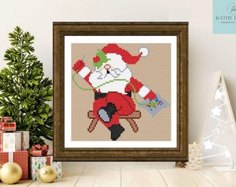 Stitching Santa Cross Stitch Pattern by Atlantic Blue Canvas®