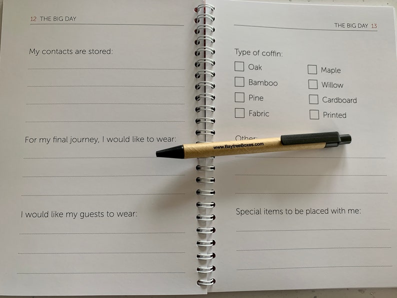 May include: A white notebook with a spiral binding. The notebook has a checklist for planning a funeral. The checklist includes questions about the type of coffin, what the deceased would like to wear, and what items to be placed with them.