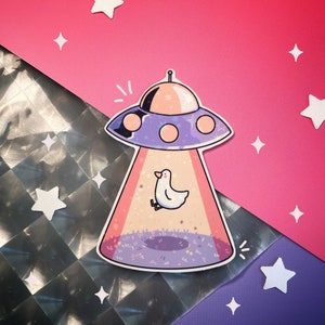 Pegatina de vinilo con forma de pato OVNI con purpurina/pegatina holográfica de nave espacial con forma de pato resistente al agua/decoración de regalo de ciencia ficción