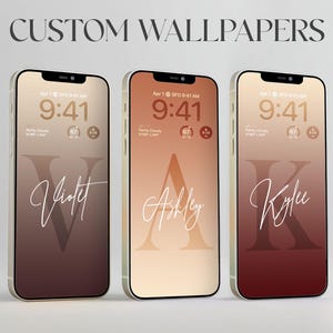 May include: Three smartphones showcasing custom wallpapers. Each phone displays a different name: Violet, Ashley, and Kylee, in a stylish script font. The background features a gradient of colours, with the text "CUSTOM WALLPAPERS" at the top.