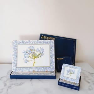 Ashdene Cloud Placemats and Coasters: Elegant Blue Agapanthus Design