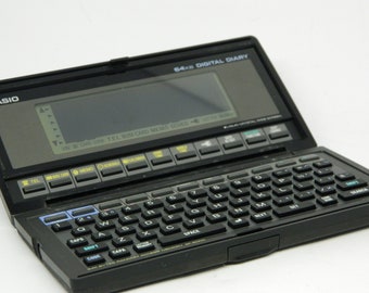 CASIO SF-8000 Retro Pocket Computer - Vintage Digital Organizer and Diary