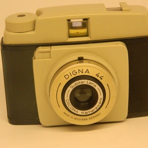 Dacora Digna 44 is a medium format 127 film viewfinder-camera 35 mm- camera made by Dacora and introduced in 1960.3