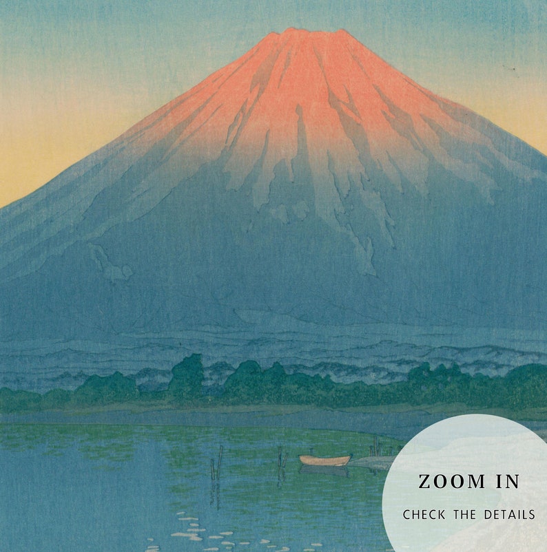 May include: A landscape print featuring Mount Fuji with a red-orange peak, set against a blue sky. A lake with a small boat and trees is in the foreground. The text "ZOOM IN" and "CHECK THE DETAILS" is in the lower right corner.