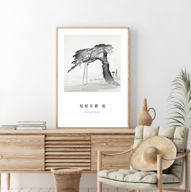 May include: A black and white framed print of a Japanese painting of a pine tree with the text "松 陰 月 暁" (Matsu Kage Tsuki Akatsuki) which translates to "Pine Shadow Moon Dawn".