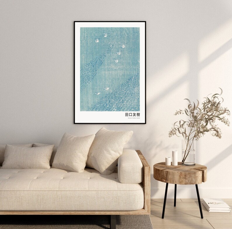 May include: A framed print of a Japanese woodblock print depicting a blue and white scene with birds flying over a body of water. The print is titled "田口 友樹".