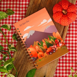 Cozy and autumnal notebook of Little Red Riding Hood and the Wolf