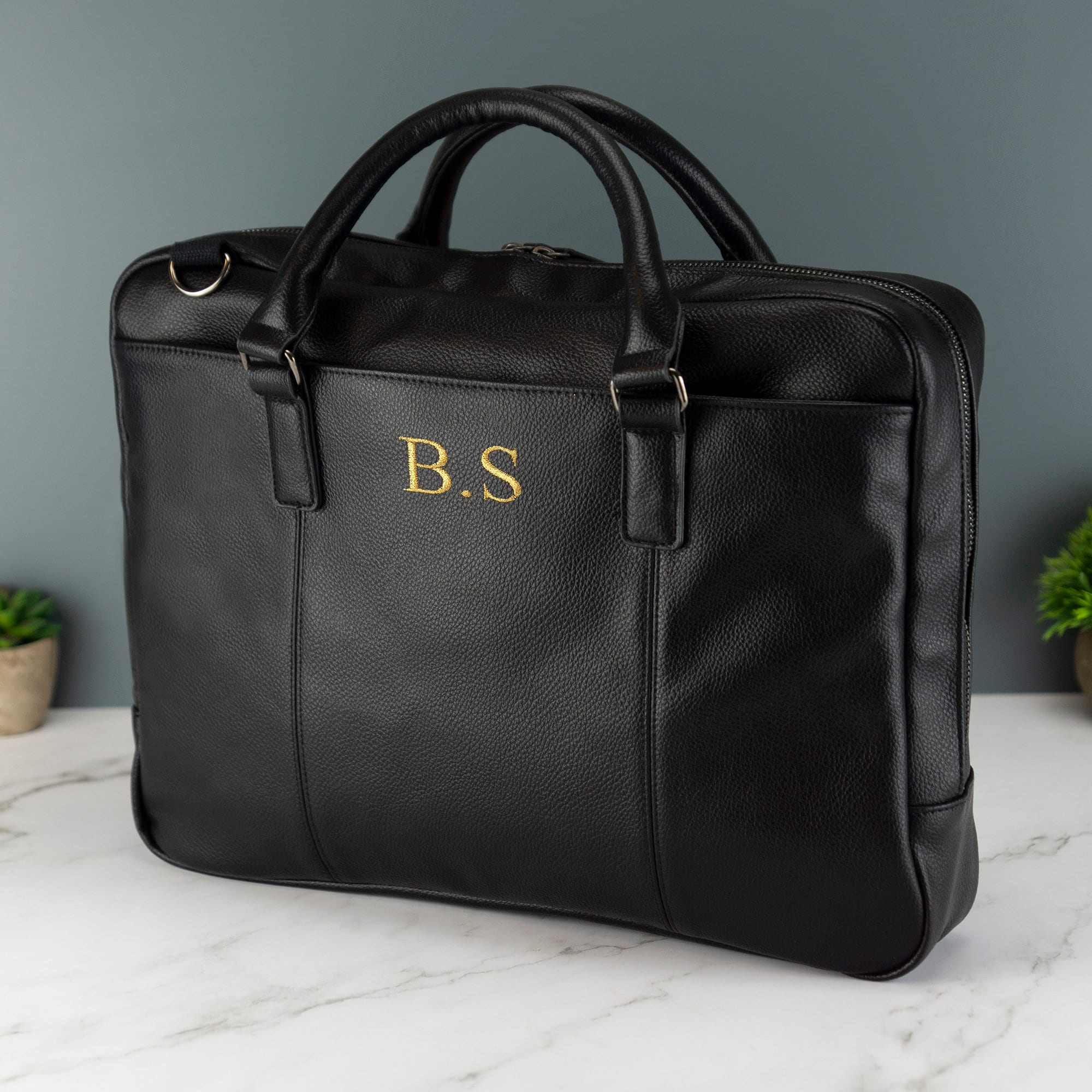 Monogrammed leather laptop outlet bag