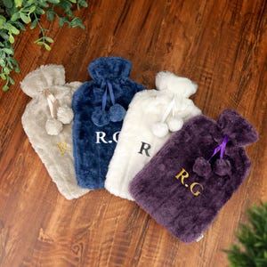 Bouillotte personnalisée brodée en peluche en fausse fourrure avec cadeau de Noël à pompons