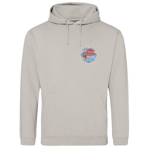 May include: A pale grey hoodie with a front pocket and a drawstring hood. The hoodie has a small, colourful globe graphic on the upper left chest. The globe design includes red, blue, and white elements.