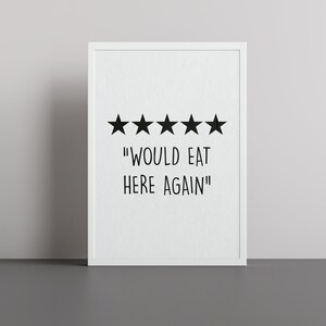 Peut inclure: Une impression encadr&eacute;e blanche avec cinq &eacute;toiles noires et le texte "WOULD EAT HERE AGAIN!"