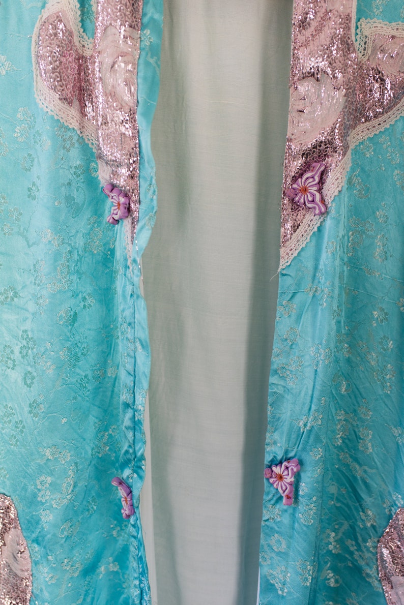 Size XS or XXS Vintage Chinese Robe in Floral Turquoise Satin with Pink Lame Details and Purple Knotted Button Closures