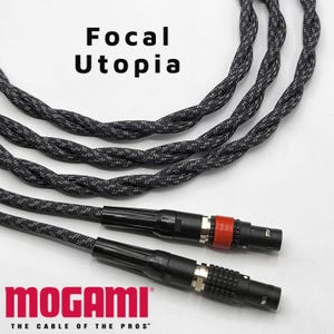 May include: A black braided cable with two black connectors, one with a red ring. The cable is labeled "Focal Utopia" and "Mogami The Cable of the Pros".
