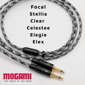 May include: A black and grey braided cable with gold-plated connectors. The cable is labeled "Mogami" and "The Cable of the Pros". The cable is compatible with Focal Stellia, Clear, Celeste, Elegia, and Elex headphones.
