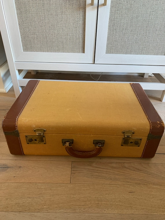 Vintage leather trim suitcase