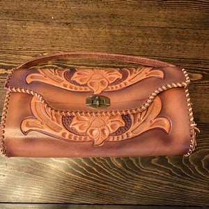 Vintage, hand tooled leather clutch
