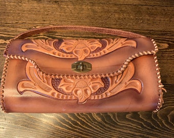 Vintage, hand tooled leather clutch