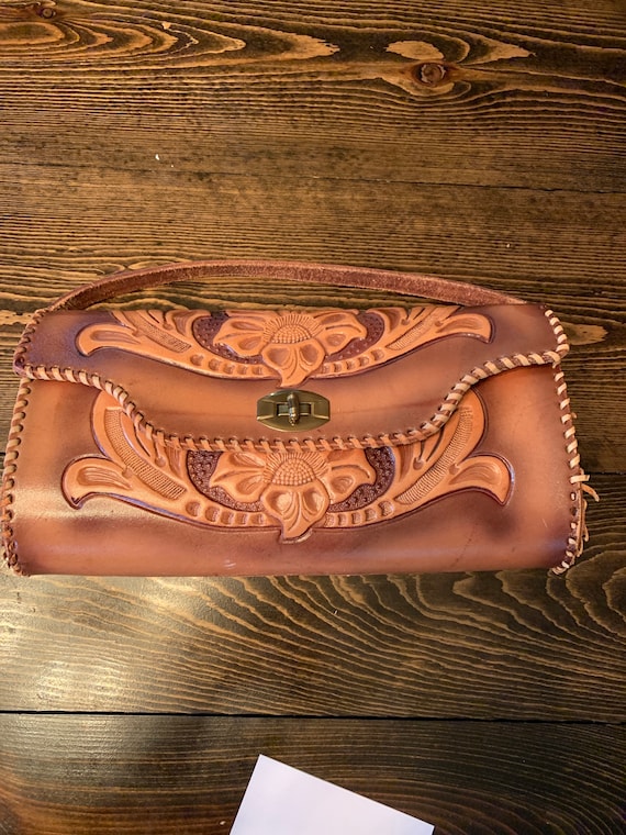Vintage, hand tooled leather clutch