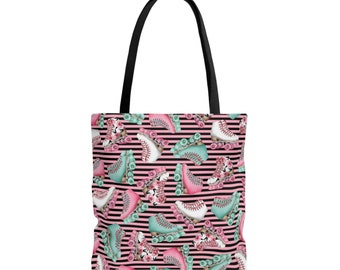 May include: A black and pink striped tote bag with a floral roller skate pattern. The roller skates are in shades of pink, green, and white.