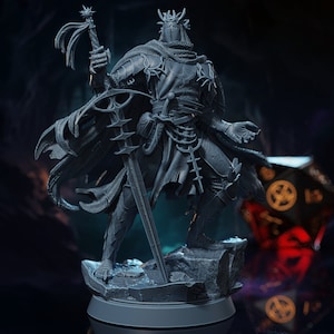 May include: A gray, detailed miniature of a knight in armor, holding a sword and wearing a helmet with a crown. The knight is standing on a rocky base.