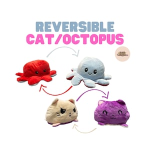 Könnte beinhalten: Wendespielzeug mit Katzen- und Oktopus-Design. Das Spielzeug wechselt von einem roten Oktopus mit wütendem Gesicht zu einem hellblauen Oktopus mit glücklichem Gesicht. Die Katzenseite wechselt von Beige zu Lila.